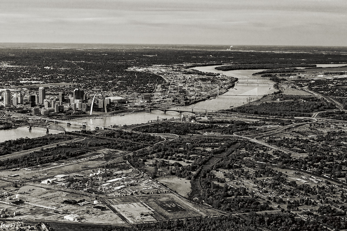 Looking upriver at St. Louis (top left), MO, and East St. Louis (bottom right), IL.